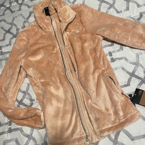 Unique colored cozy NWT North face jacket! Never worn.